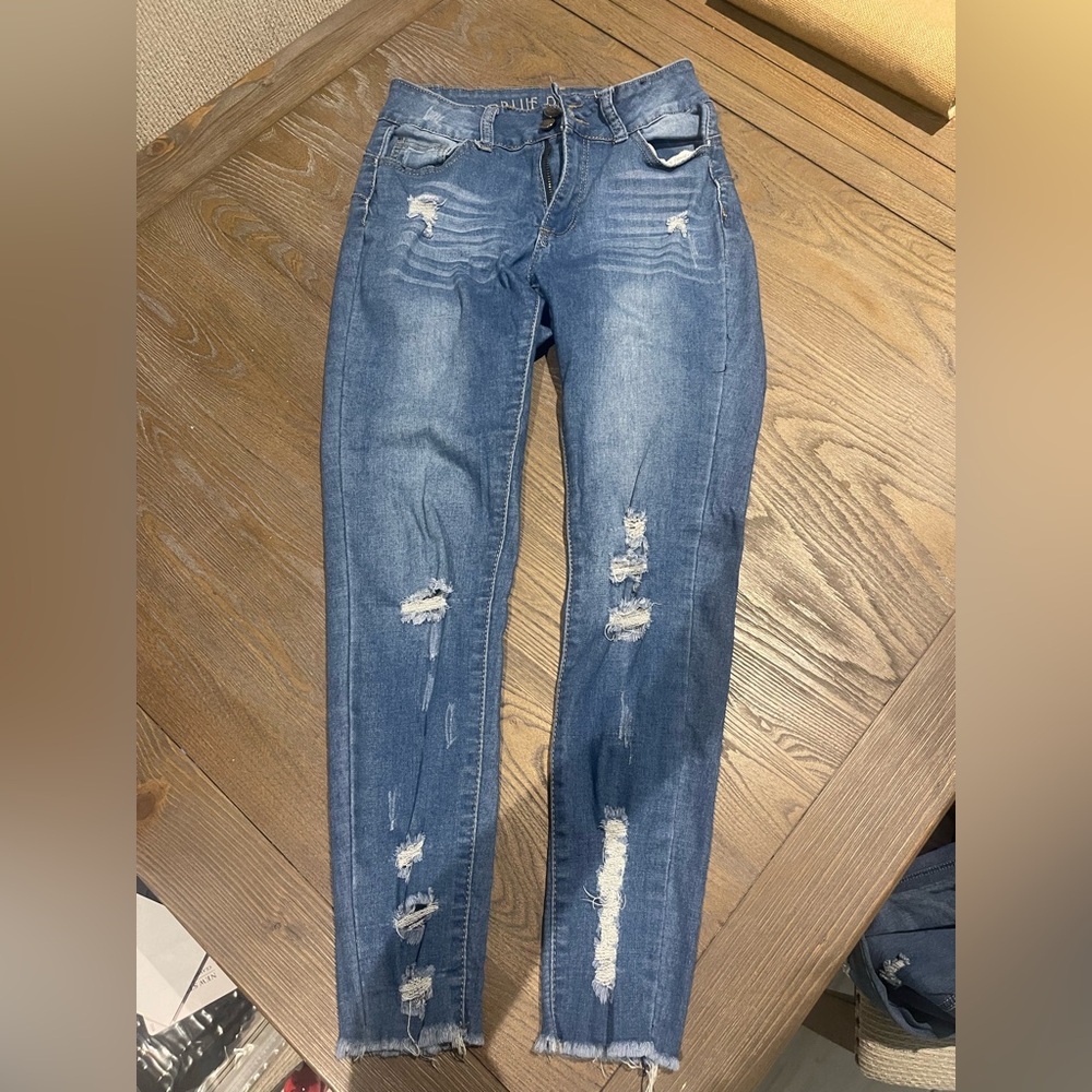 Women’s Distressed Blue Skinny Jeans
